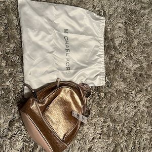 Authentic Never Used Michael Kors Rose Gold Backpack